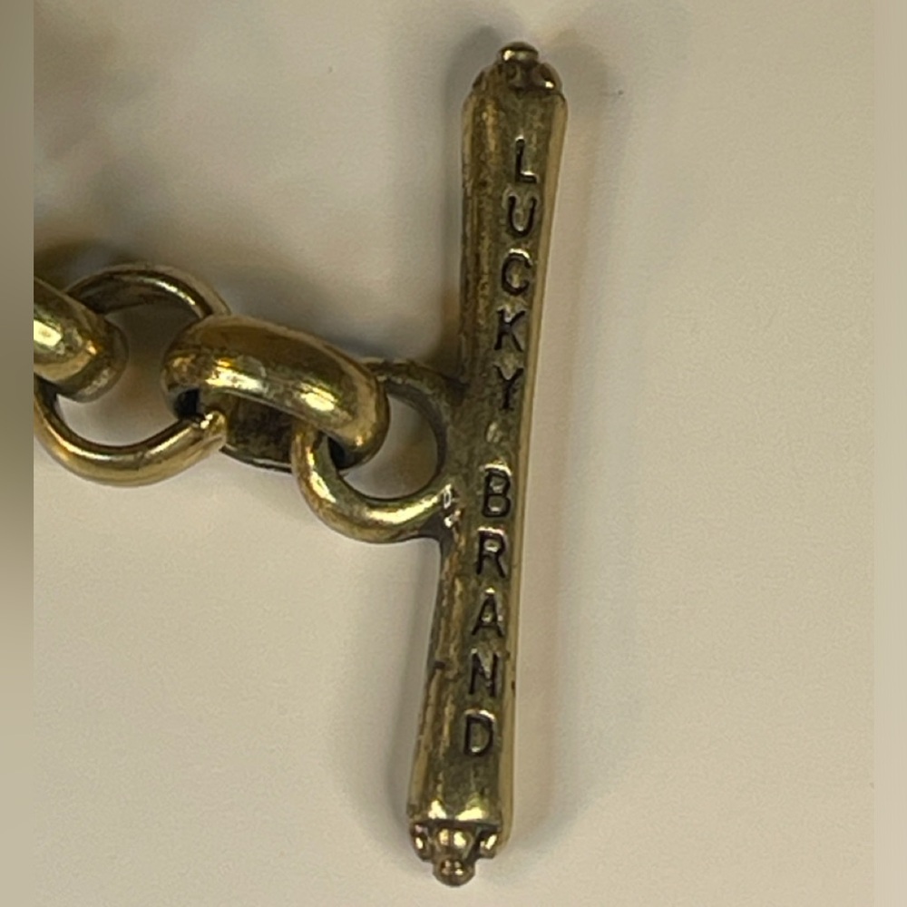Lucky Brand gold-tone beaded bracelet with a signature four-leaf clover charm. - Picture 4 of 6